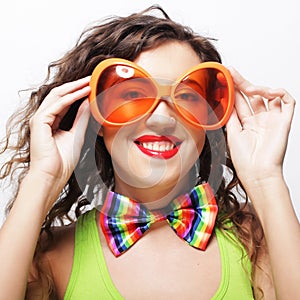 woman wearing big bright sunglasses