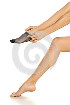 Woman wearing black short nylon socks