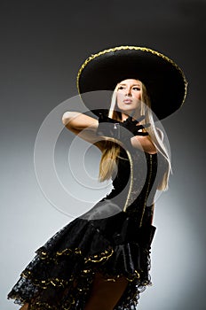 Woman wearing black sombrero