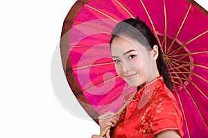 A woman wearing a chinese dress holding an umbrella