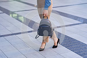 Woman legs in high hill shoes