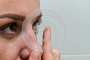 Woman wearing contact lenses for vision correction