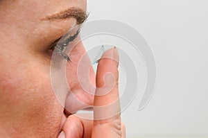 Woman wearing contact lenses for vision correction