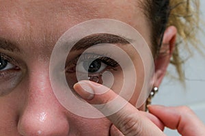 Woman wearing contact lenses for vision correction