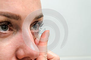 Woman wearing contact lenses for vision correction