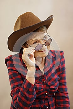 Woman wearing cowboy hat