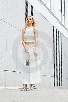 Woman wearing crop top and culottes