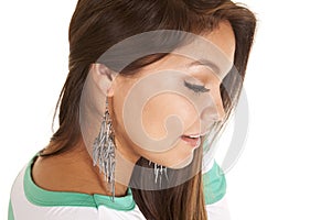 Woman wearing dangle earrings