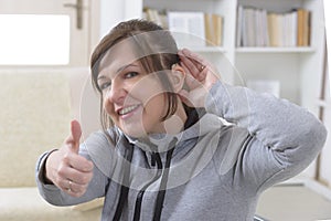 Woman wearing deaf aid