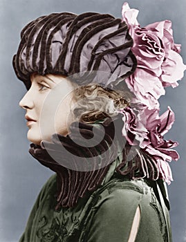 Woman wearing elaborate hat