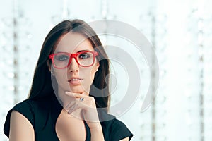 Woman Wearing Eyeglasses in Optical Store