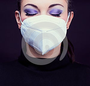 Woman wearing face mask photo