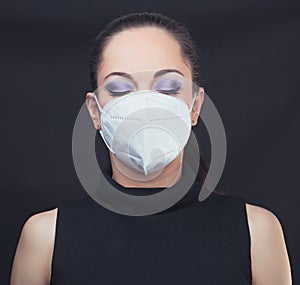 Woman wearing face mask photo