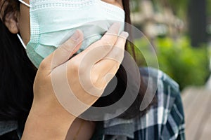 Woman wearing face mask protect filter against air pollution PM2.5 or wear N95 mask. protect pollution, anti smog and viruses,