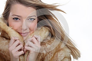 Woman wearing a fur coat
