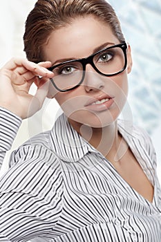 Woman Wearing Glasses in office