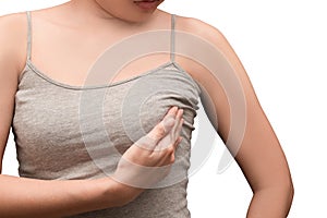 Woman wearing a gray spaghetti strap checking her breast, on white, Concept of breast self-exam