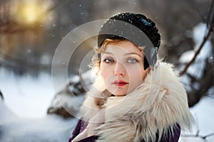 Woman wearing grey felt hat in retro stlyle