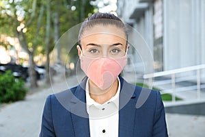 Woman wearing handmade cloth mask. Personal protective equipment during COVID-19 pandemic