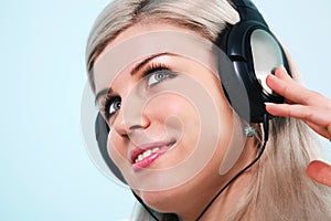 Woman wearing headphones listening to music
