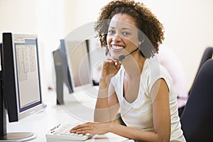 Woman wearing headset smiling