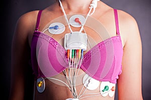 Woman wearing a Holter Heart Monitor