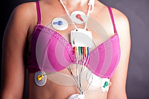 Woman wearing a Holter Heart Monitor photo