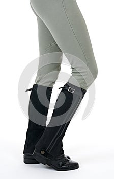 Woman wearing horse riding boots and breeches photo