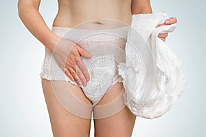 Woman wearing incontinence diaper