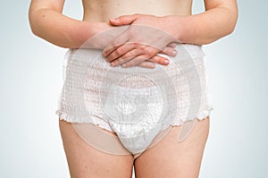 Woman wearing incontinence diaper
