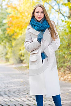 Woman Wearing Long Coat Outside in Autumn