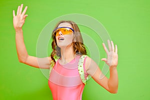 Woman wearing lycra jumpsuit and protect glasses