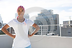 Woman wearing mantra scarf posing in city