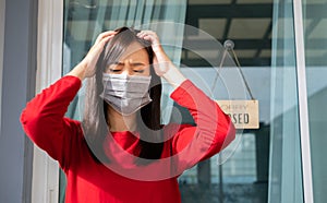 Woman wearing mask closed store with sign board front door shop, Small business come back turning