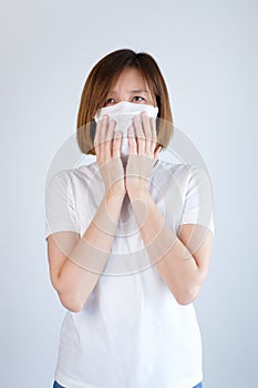 Woman wearing mask get sick from corona virus,, flu symptom as sneezing, cough, fever, body ache, breathing , pain