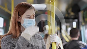 Woman wearing a medical mask and seals is not feeling well from headaches and sore throat while traveling by bus, virus