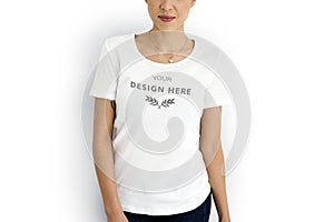 Woman wearing mockup design space white tee photo