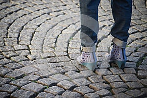woman wearing originals shoes in the street