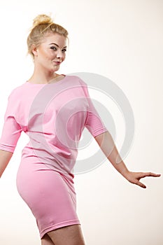 Woman wearing pink elegant dress
