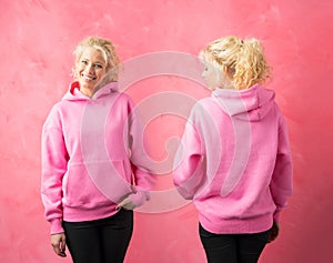 Woman wearing pink hoodie, template for promo print design