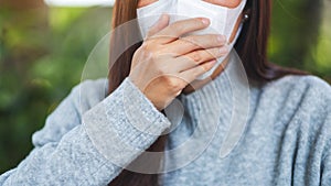 An woman wearing protective face mask for Healthcare and Covid-19 or 2020 virus concept