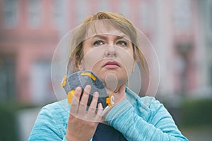 Woman wearing a real anti-pollution, anti-smog and viruses face mask