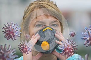 Woman wearing a real anti-pollution and anti-viruses face mask