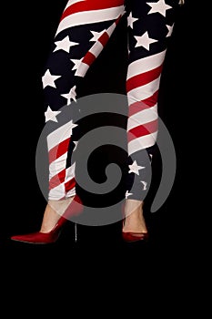 Woman wearing red high heel and flag leggings