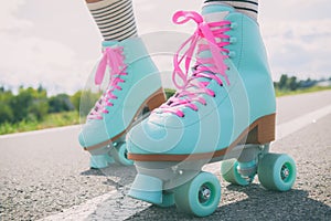 Woman wearing roller skates with pink laces