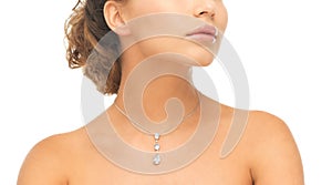 Woman wearing shiny diamond necklace