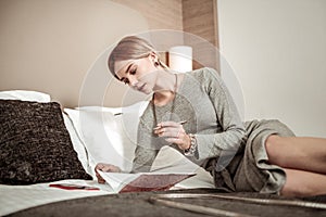 Woman wearing stylish bracelet feeling busy making her schedule