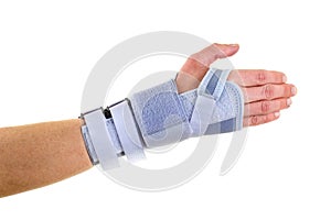 Woman Wearing Supportive Wrist Brace in Studio