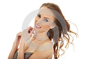 Woman wearing swimming bra.