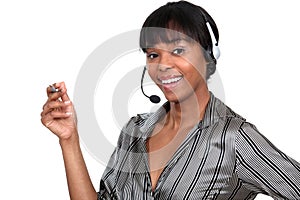 Woman wearing a telephone headset